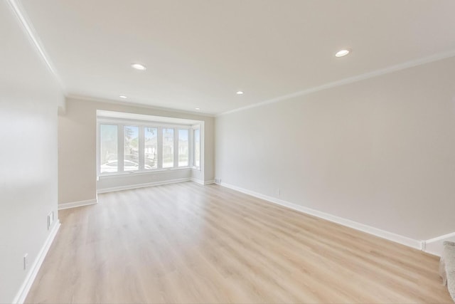 5949 W 55th St, Chicago, IL 60638 - empty room with ornamental molding, light wood finished floors, and recessed lighting