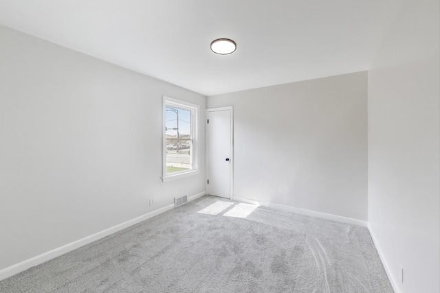 5949 W 55th St, Chicago, IL 60638 - carpeted spare room featuring baseboards