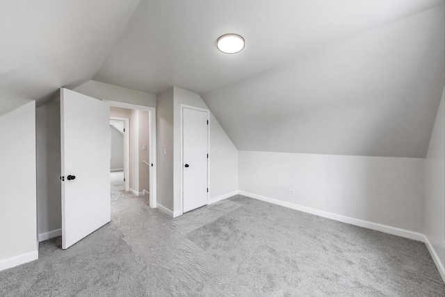 5949 W 55th St, Chicago, IL 60638 - additional living space with carpet and lofted ceiling