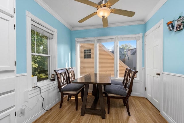 21276 W Arbor Ln, Lake Zurich, IL 60047 - dining space featuring light wood-style flooring, wainscoting, ornamental molding, and a ceiling fan