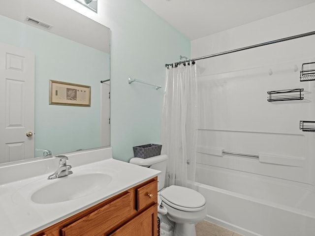 6079 Delaney Dr, Hoffman Estates, IL 60192 - bathroom with vanity, shower / bath combo with shower curtain, and tile patterned floors