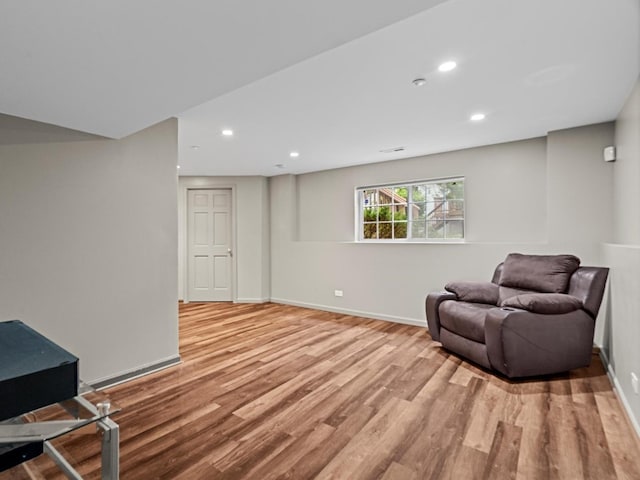 6079 Delaney Dr, Hoffman Estates, IL 60192 - living area featuring wood finished floors and recessed lighting