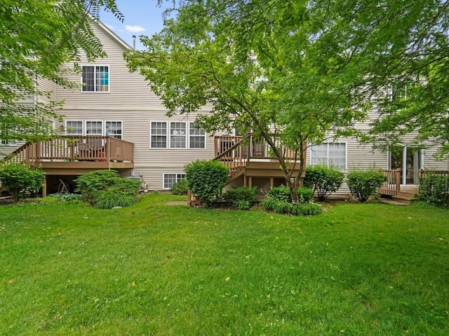 6079 Delaney Dr, Hoffman Estates, IL 60192 - rear view of house with a wooden deck, a yard, and stairway
