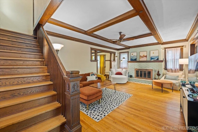 1427 Camp Ave, Rockford, IL 61103 - living area featuring coffered ceiling, stairway, plenty of natural light, ceiling fan, and wood finished floors
