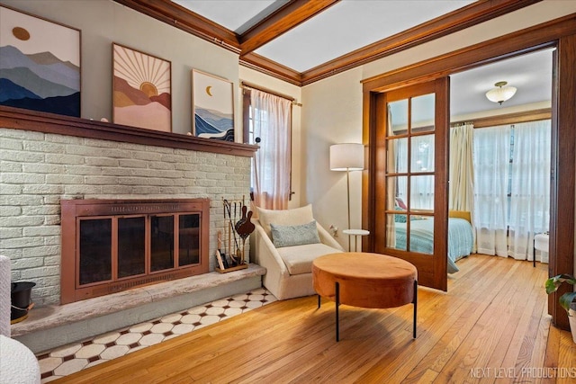 1427 Camp Ave, Rockford, IL 61103 - sitting room featuring a fireplace, hardwood / wood-style flooring, beam ceiling, and ornamental molding