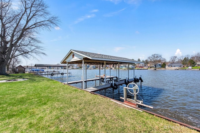 1425 N River Rd, Mchenry, IL 60051 - dock featuring boat lift, a yard, and a water view