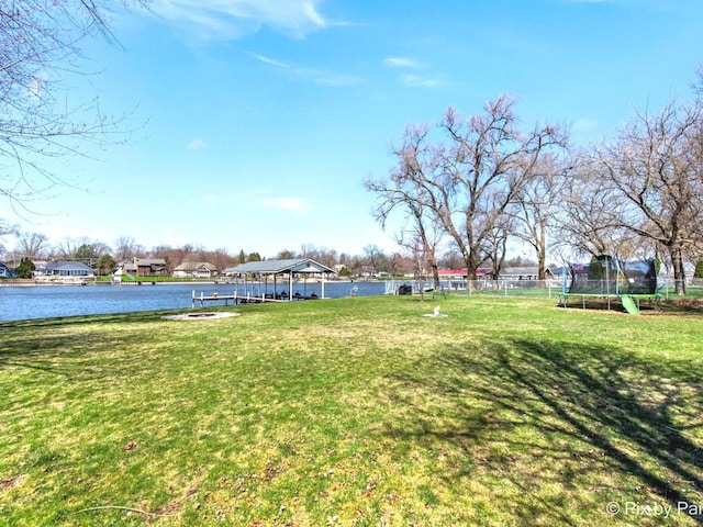 1425 N River Rd, Mchenry, IL 60051 - view of yard with a trampoline and a water view