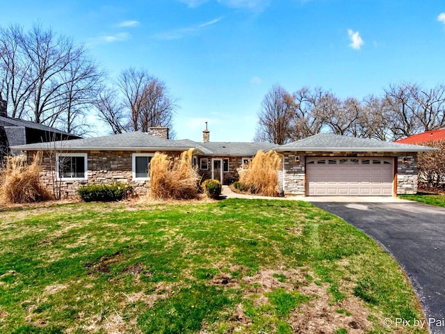 1425 N River Rd, Mchenry, IL 60051 - single story home featuring stone siding, a chimney, driveway, and a garage