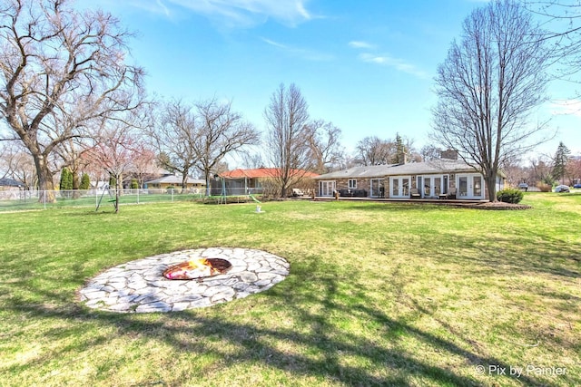 1425 N River Rd, Mchenry, IL 60051 - view of yard with french doors and a fire pit