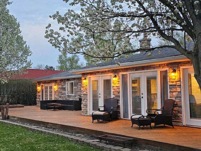 1425 N River Rd, Mchenry, IL 60051 - back of property featuring french doors, stone siding, a deck, and a chimney