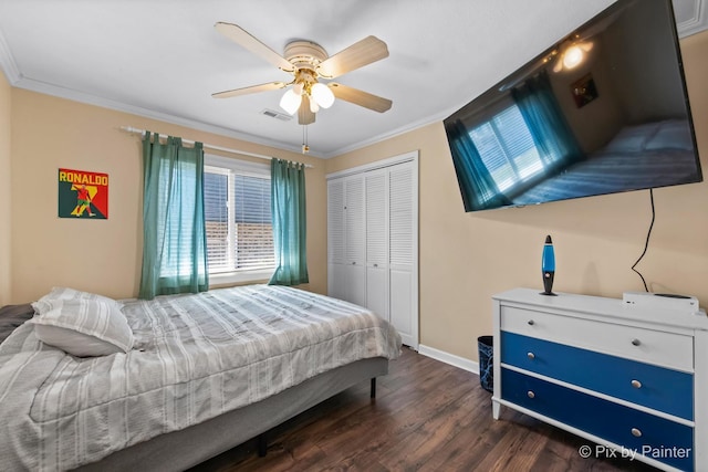 1425 N River Rd, Mchenry, IL 60051 - bedroom with a closet, dark wood-style floors, ornamental molding, and a ceiling fan