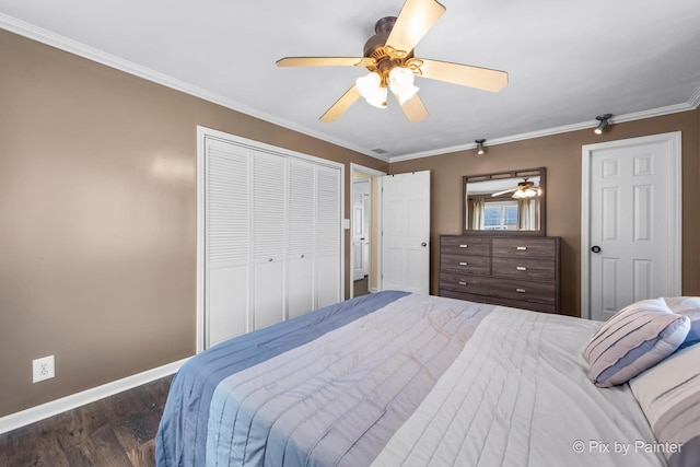 1425 N River Rd, Mchenry, IL 60051 - bedroom featuring wood finished floors, ornamental molding, a closet, and a ceiling fan
