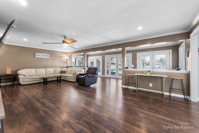 1425 N River Rd, Mchenry, IL 60051 - living area with ornamental molding, french doors, wood finished floors, a ceiling fan, and plenty of natural light