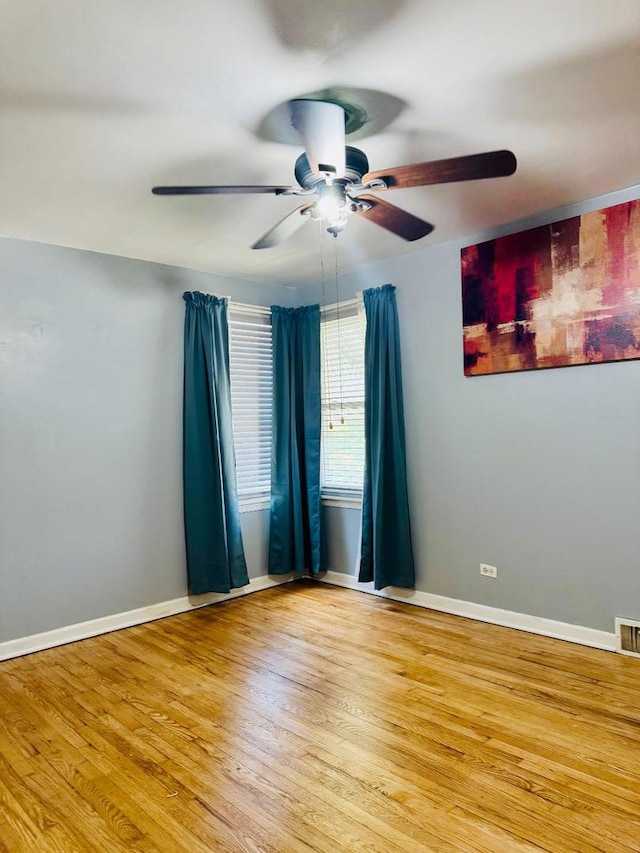 1621 N Luna Ave, Chicago, IL 60639 - unfurnished room featuring a ceiling fan and light wood finished floors