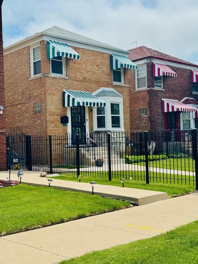 1621 N Luna Ave, Chicago, IL 60639 - view of property with brick siding