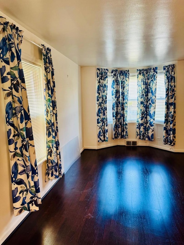 1621 N Luna Ave, Chicago, IL 60639 - spare room featuring wood finished floors