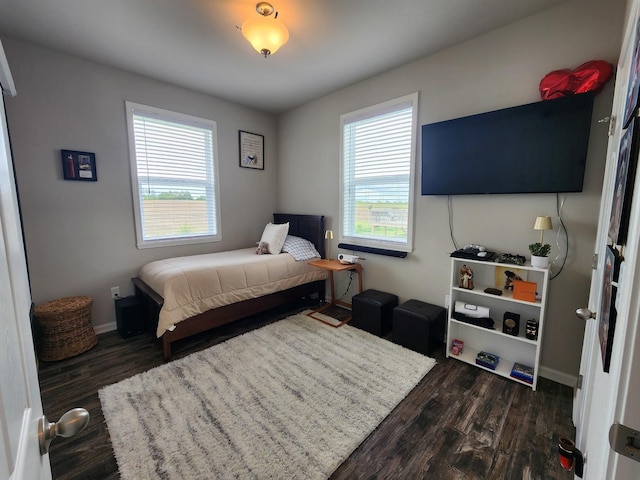 12549 New York St, Loves Park, IL 61111 - bedroom featuring dark wood-type flooring and baseboards