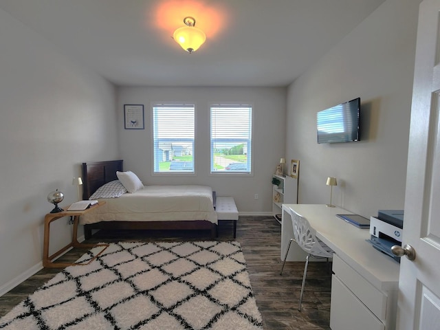 12549 New York St, Loves Park, IL 61111 - bedroom with dark wood finished floors and a desk