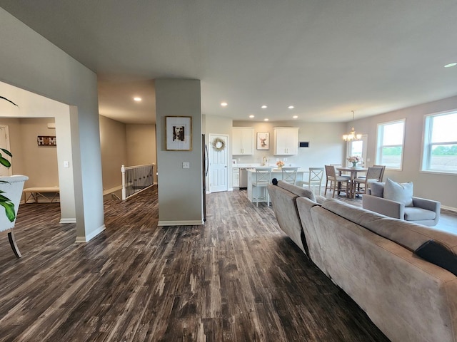 12549 New York St, Loves Park, IL 61111 - living area with dark wood finished floors, recessed lighting, and a chandelier