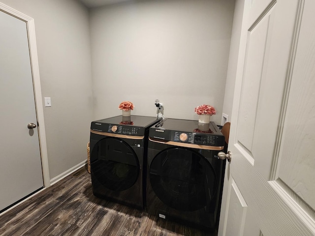 12549 New York St, Loves Park, IL 61111 - washroom featuring washer and clothes dryer and dark wood finished floors