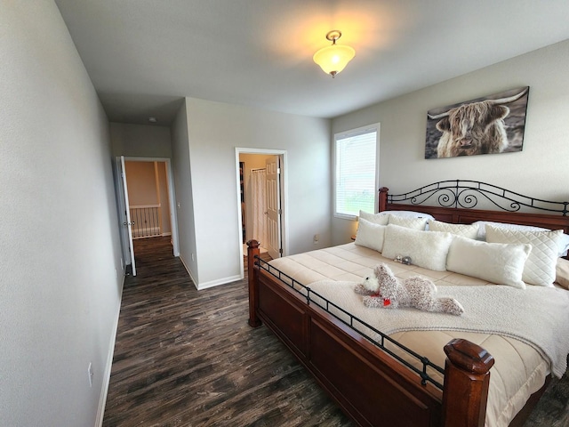 12549 New York St, Loves Park, IL 61111 - bedroom featuring dark wood-type flooring and baseboards