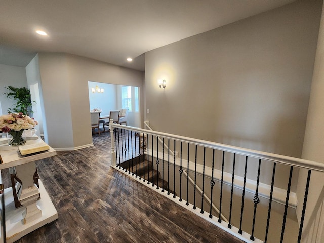 12549 New York St, Loves Park, IL 61111 - corridor featuring an upstairs landing, wood finished floors, recessed lighting, and a chandelier
