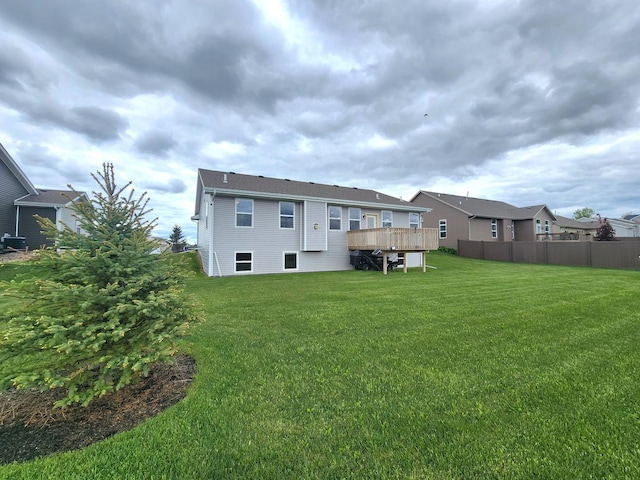 12549 New York St, Loves Park, IL 61111 - rear view of house with a deck