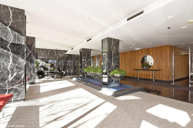 3900 N Lake Shore Dr Unit 7C, Chicago, IL 60613 - lobby with recessed lighting and wooden walls