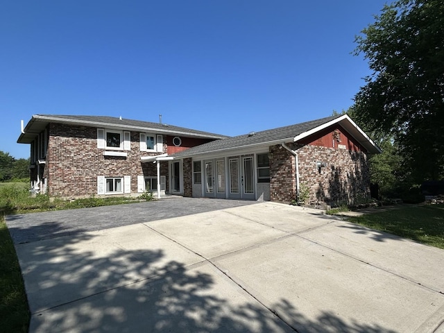 194 S Collins St, South Elgin, IL 60177 - view of front of property with brick siding and driveway