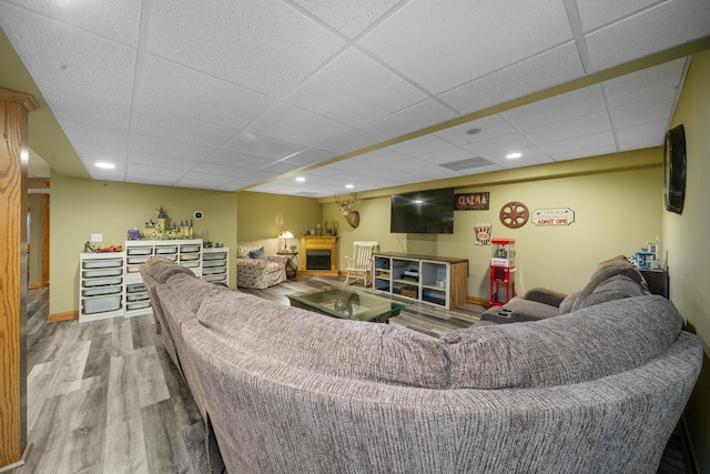 990 Fox Trail Ln, Somonauk, IL 60552 - living area featuring wood finished floors, a paneled ceiling, and recessed lighting