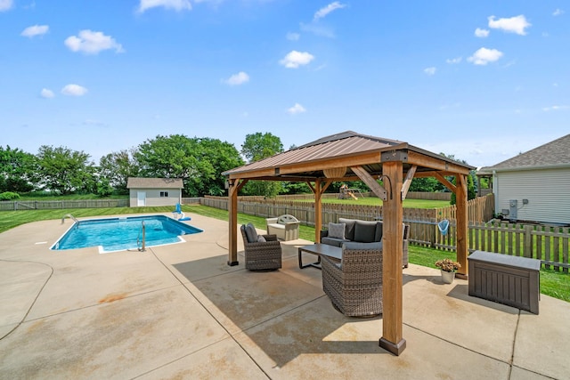 990 Fox Trail Ln, Somonauk, IL 60552 - view of pool with a gazebo, an outdoor hangout area, a patio area, a fenced backyard, and a shed