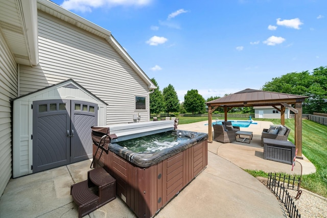 990 Fox Trail Ln, Somonauk, IL 60552 - view of patio / terrace featuring a hot tub, a gazebo, and an outdoor hangout area