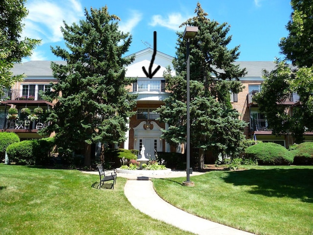 5100 Carriageway Dr Unit 305-2, Rolling Meadows, IL 60008 - view of community with a lawn
