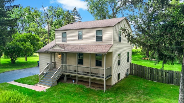 3304 W 160th St, Markham, IL 60428 - view of front facade featuring covered porch, roof with shingles, and asphalt driveway