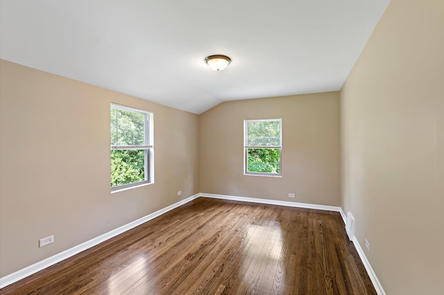 3304 W 160th St, Markham, IL 60428 - spare room with dark wood-style floors and vaulted ceiling