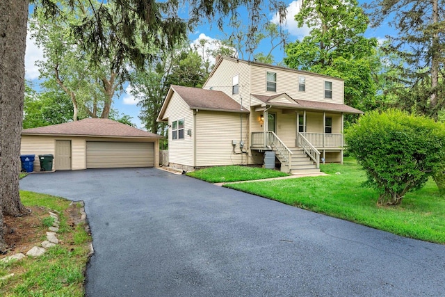 3304 W 160th St, Markham, IL 60428 - view of front of home with a garage, an outdoor structure, a porch, and a front lawn