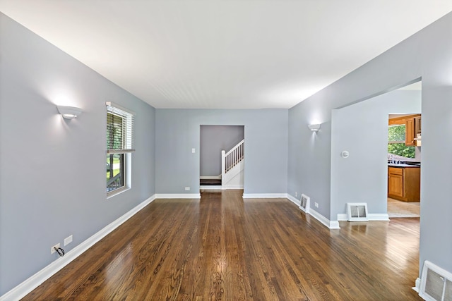 3304 W 160th St, Markham, IL 60428 - empty room featuring plenty of natural light, dark wood-type flooring, and stairway