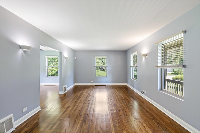 3304 W 160th St, Markham, IL 60428 - empty room featuring healthy amount of natural light and dark wood finished floors