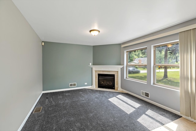 3304 W 160th St, Markham, IL 60428 - unfurnished living room with a tiled fireplace and carpet
