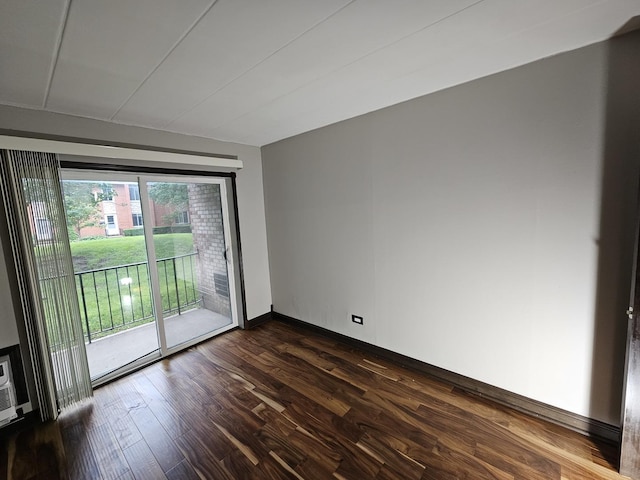 520 Burning Tree Ln Unit 111, Naperville, IL 60563 - empty room featuring dark wood-type flooring and baseboards