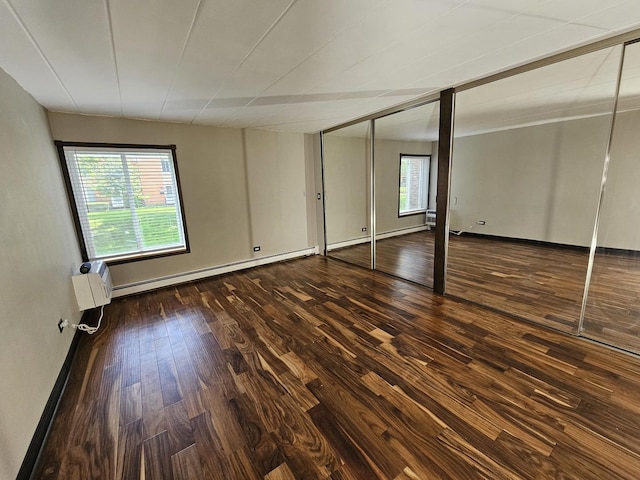 520 Burning Tree Ln Unit 111, Naperville, IL 60563 - unfurnished bedroom with a baseboard radiator and wood-type flooring