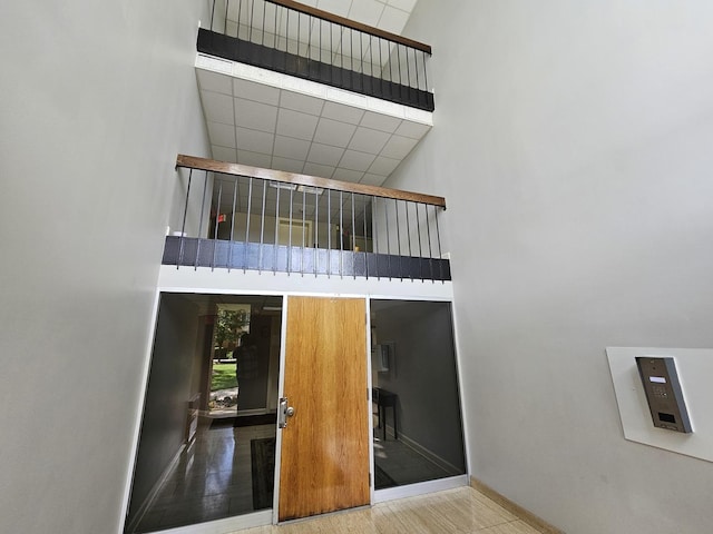 520 Burning Tree Ln Unit 111, Naperville, IL 60563 - stairway with a high ceiling and wood finished floors