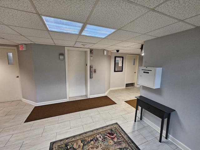 520 Burning Tree Ln Unit 111, Naperville, IL 60563 - entryway featuring elevator and a drop ceiling