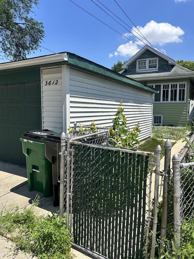 3612 E Ave, Berwyn, IL 60402 - view of home's exterior featuring an outdoor structure and a garage