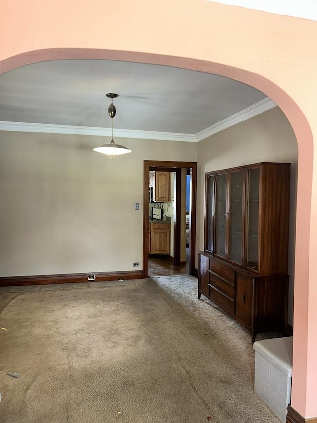 3612 E Ave, Berwyn, IL 60402 - carpeted spare room with arched walkways and ornamental molding