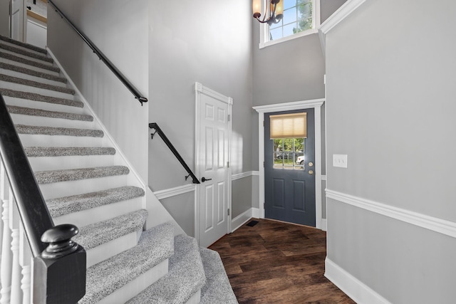 18788 S Burnside Station Dr, Mokena, IL 60448 - foyer featuring stairway, plenty of natural light, a towering ceiling, and dark wood-style flooring
