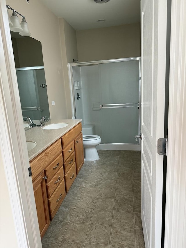13044 Redstone Dr, Huntley, IL 60142 - full bath featuring a shower with shower door and double vanity