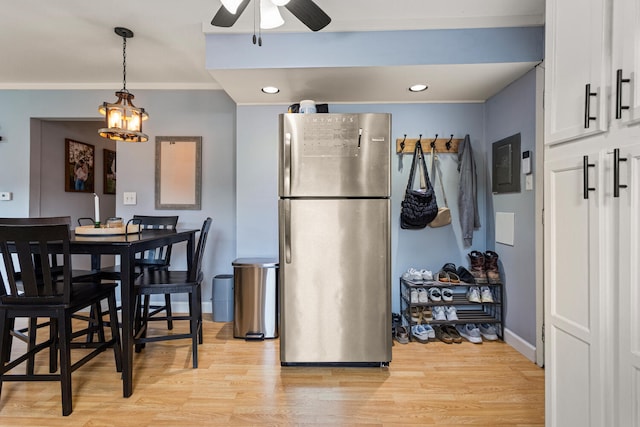 405 N Vorcey St, Tolono, IL 61880 - kitchen with freestanding refrigerator, a ceiling fan, light wood finished floors, white cabinetry, and recessed lighting