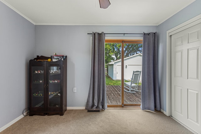 405 N Vorcey St, Tolono, IL 61880 - empty room with carpet floors, ornamental molding, and ceiling fan