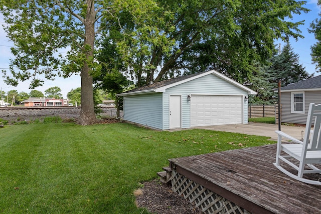 405 N Vorcey St, Tolono, IL 61880 - view of yard featuring an outbuilding, a garage, and a deck